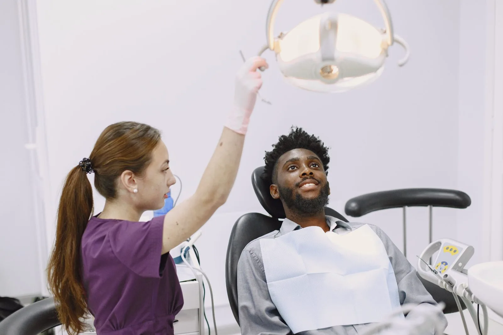 Dentist explaining a treatment plan to a patient in the studio